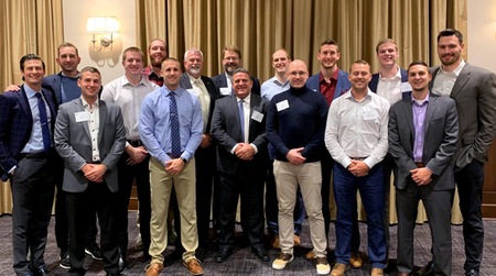 Men's Basketball alumni gather at the annual Tip Off Dinner and Reverse Raffle fundraiser. 