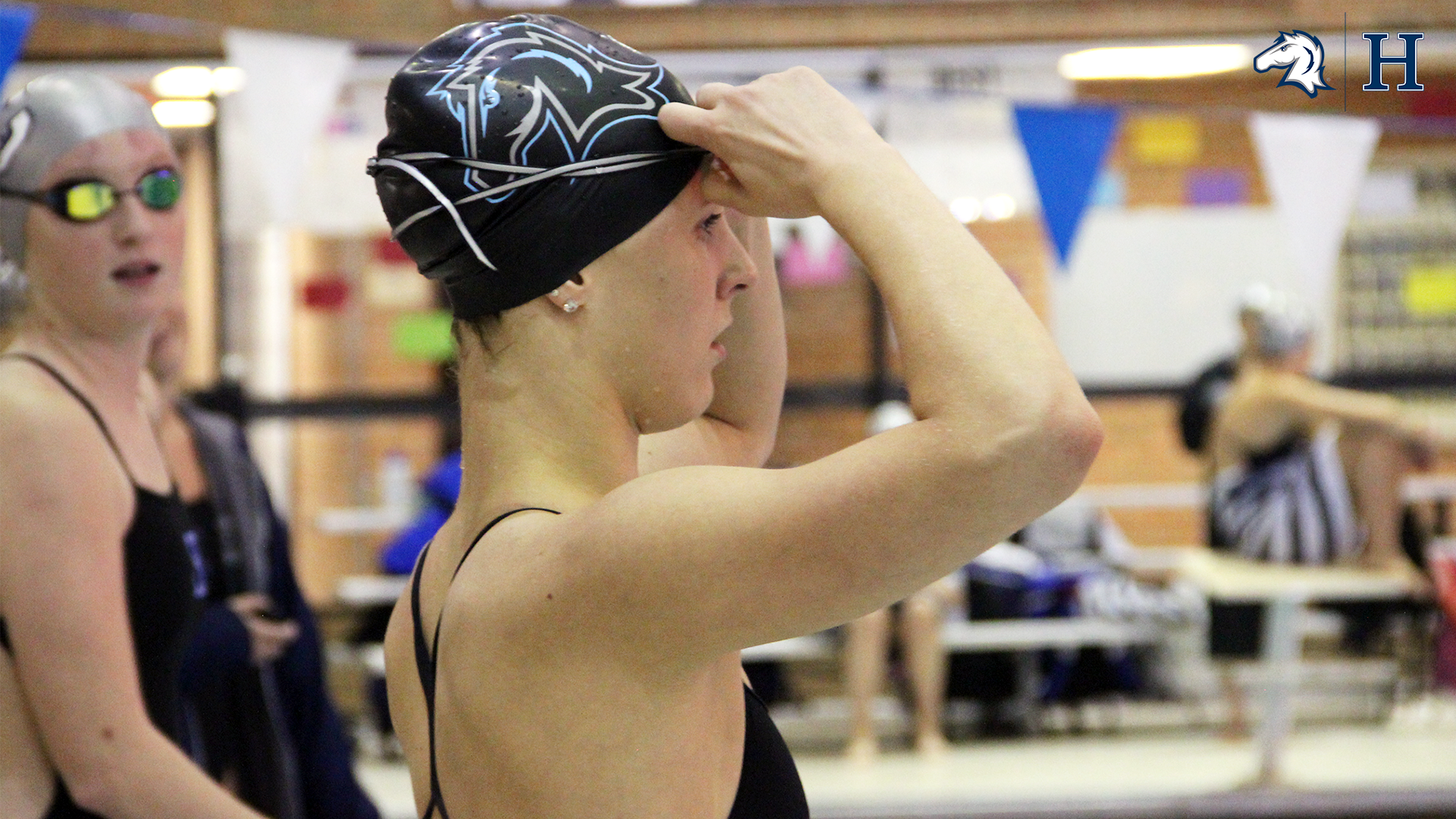 Charger women's swim team improves to 7-0 with 163-117 win at Findlay