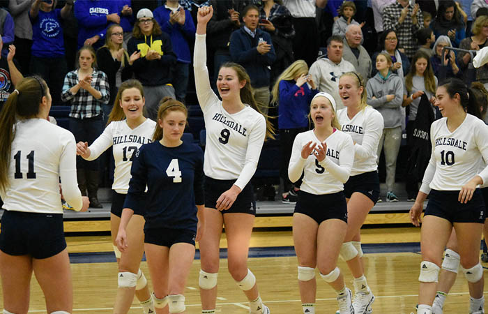 The Charger volleyball team celebrates its 3-0 win over Findlay Friday night. Photo by Carly Gouge